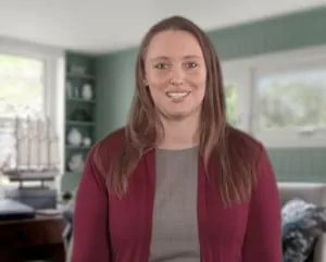 woman in house looking at camera